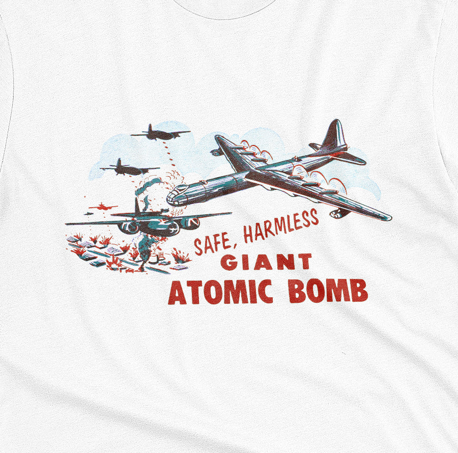 A white t-shirt with the lid graphics from the 'Giant Atomic Bomb' toy packaging., popular in the 1960s.