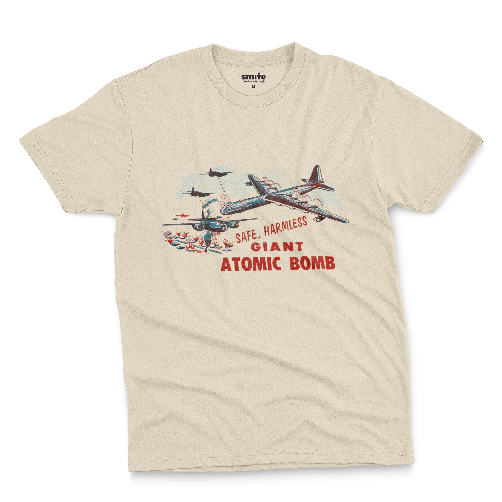 A beige t-shirt with the lid graphics from the 'Giant Atomic Bomb' toy packaging., popular in the 1960s.