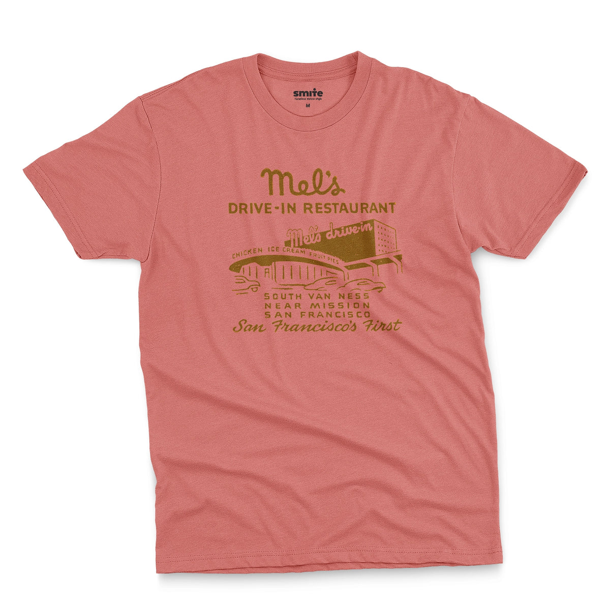 A coral pink t-shirt featuring an advertisement for 'Mel's Drive-In Restaurant' in San Francisco.