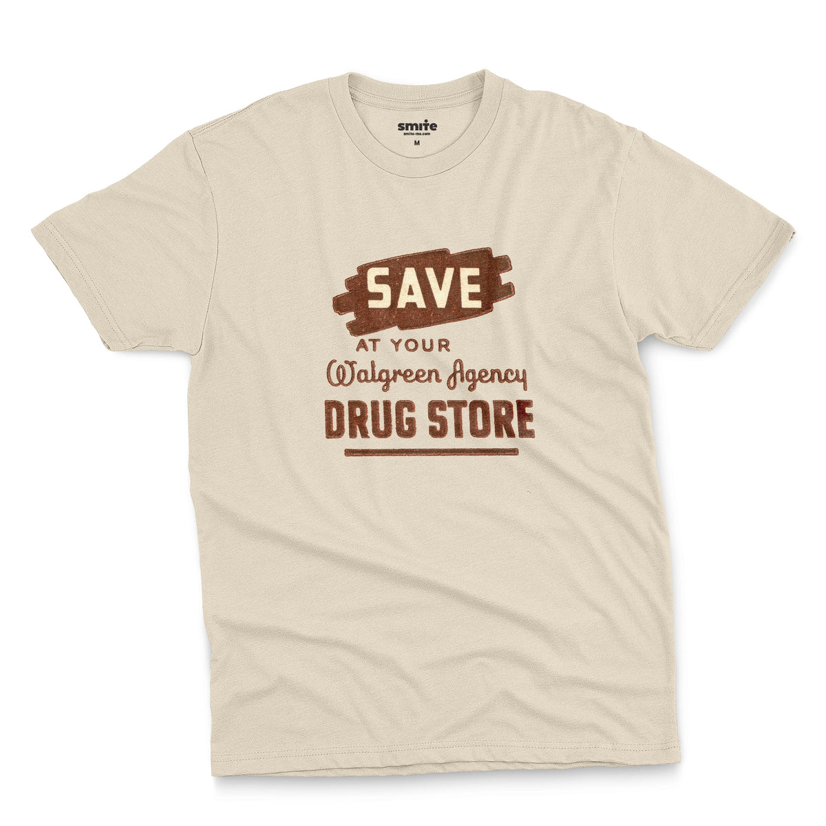A beige t-shirt with a retro graphic print that reads 'SAVE AT YOUR Walgreen Agency DRUG STORE' from the 1960s.