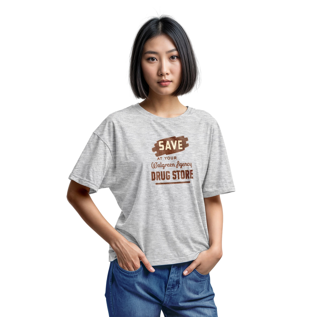 A gray marle t-shirt with a retro graphic print that reads 'SAVE AT YOUR Walgreen Agency DRUG STORE' from the 1960s.