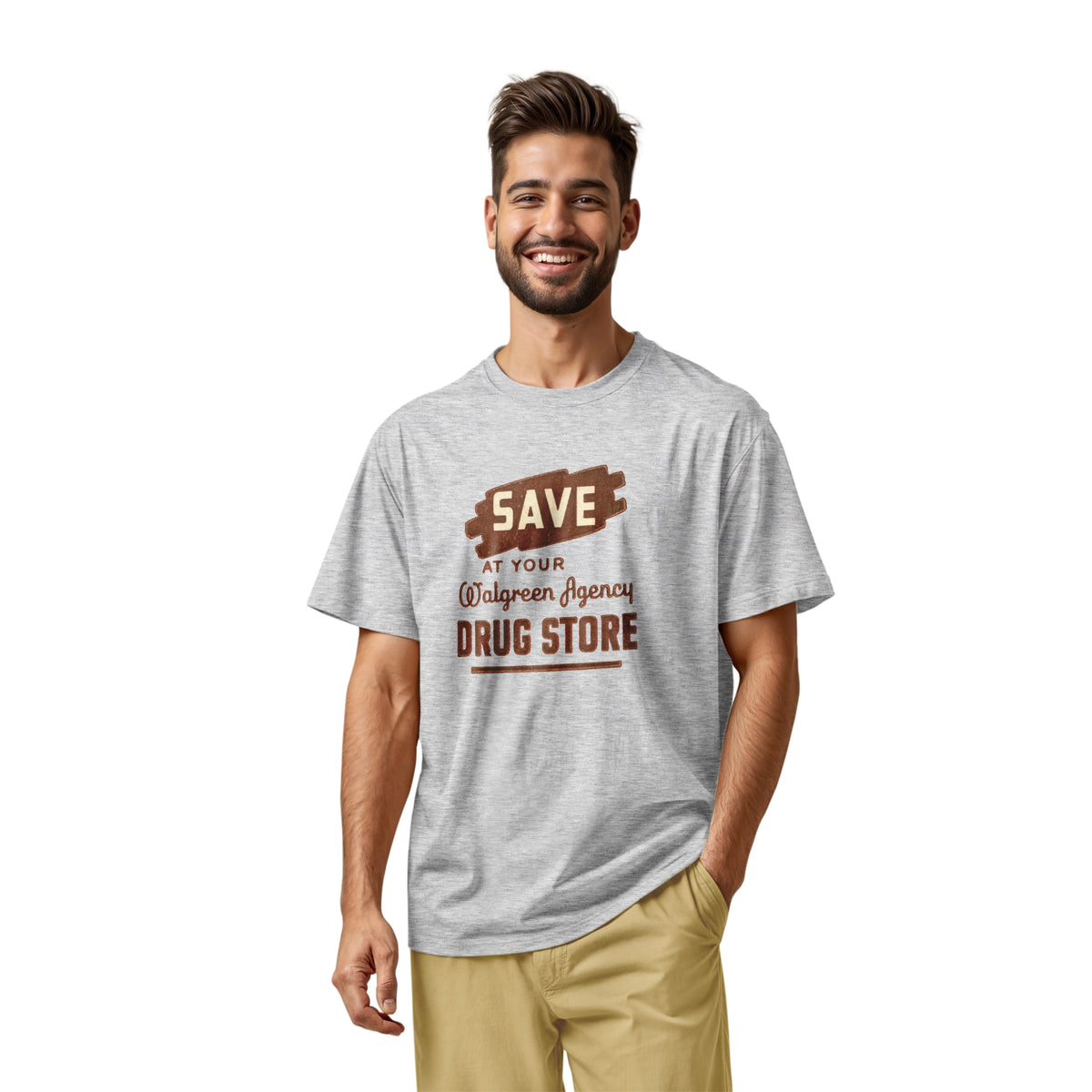 A gray marle t-shirt with a retro graphic print that reads 'SAVE AT YOUR Walgreen Agency DRUG STORE' from the 1960s.