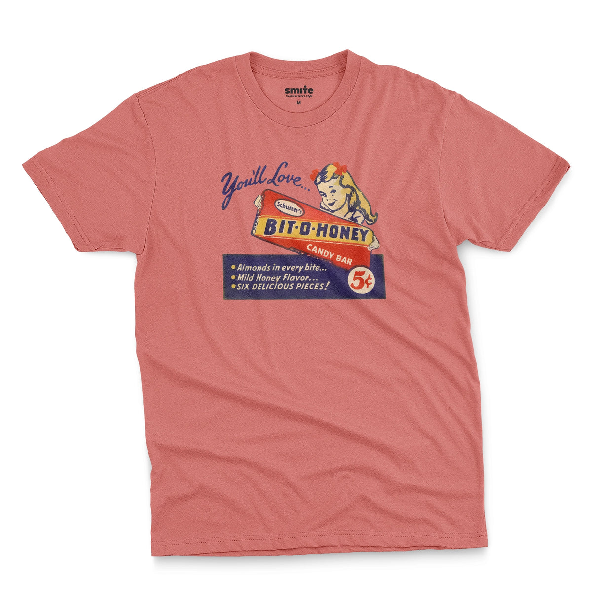 A coral pink t-shirt with a vintage advertisement for the Bit-O-Honey candy bar from the 1960s.