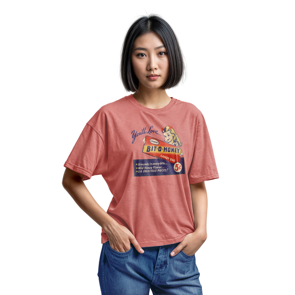 A coral pink t-shirt with a vintage advertisement for the Bit-O-Honey candy bar from the 1960s.