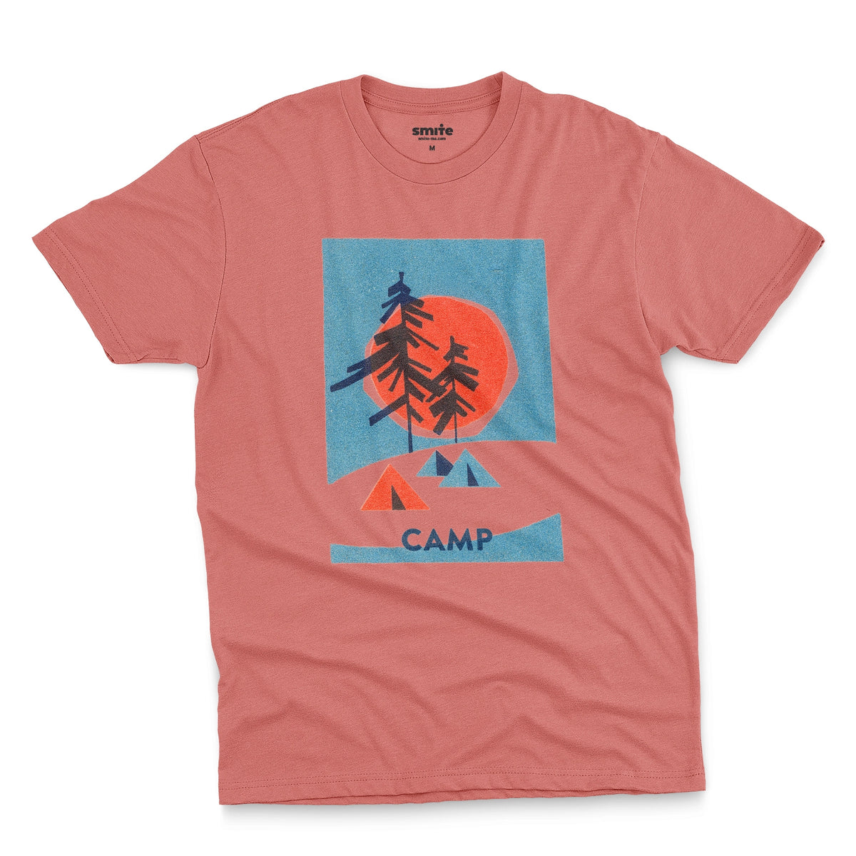 A coral pink t-shirt featuring a 1960s retro-style graphic print of pine trees in front of a large orange-red sun within a blue square, with small orange and blue tents below and the word 'CAMP'.