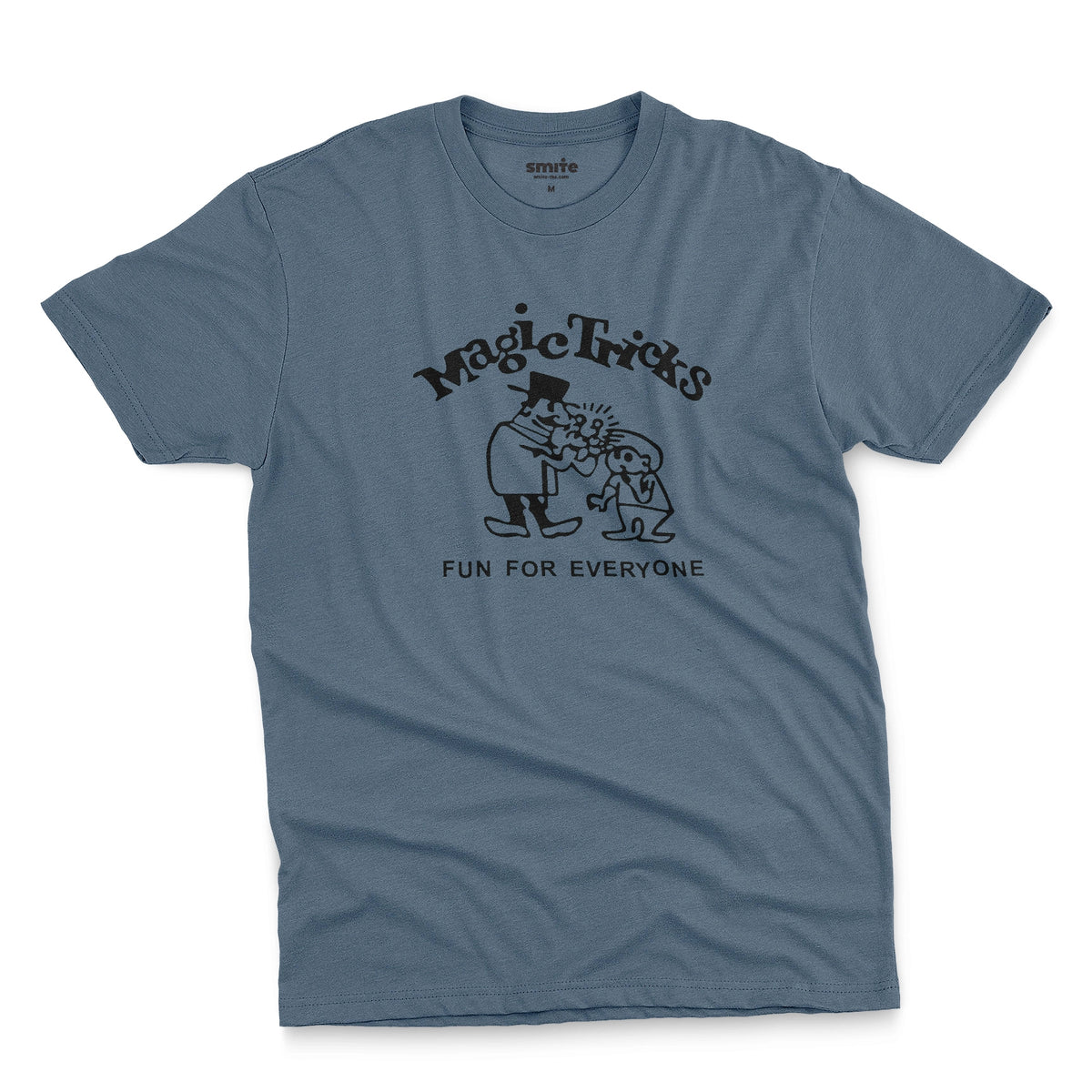 A blue t-shirt with a black graphic print on the front that reads 'Magic Tricks' above a cartoon of a magician and a spectator, with 'FUN FOR EVERYONE' printed below.