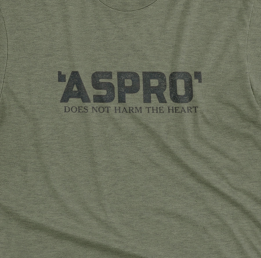 A green t-shirt with a retro Aspro headache tablet logo and the tagline 'DOES NOT HARM THE HEART'.