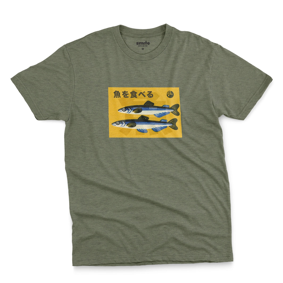 A green t-shirt with a rectangular graphic print on the chest showing two blue and silver fish on a yellow background with the Japanese text 'Eat Fish'.