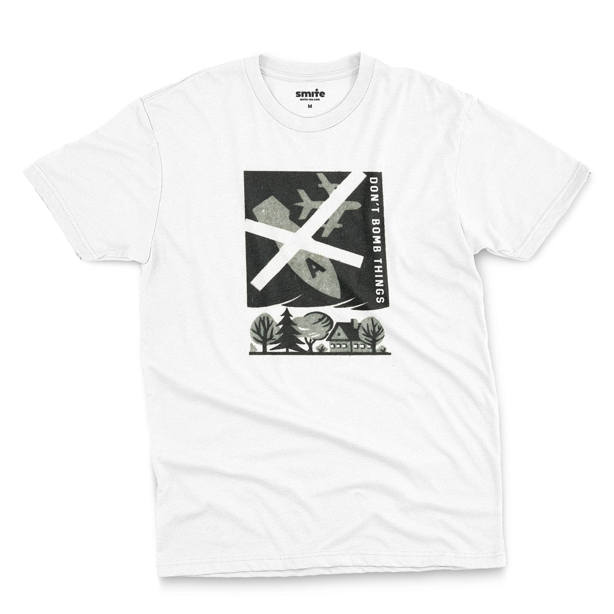 A white t-shirt with a retro graphic print of an anti-war message featuring a cross, a plane, a house, and the text 'DON'T BOMB THINGS'.