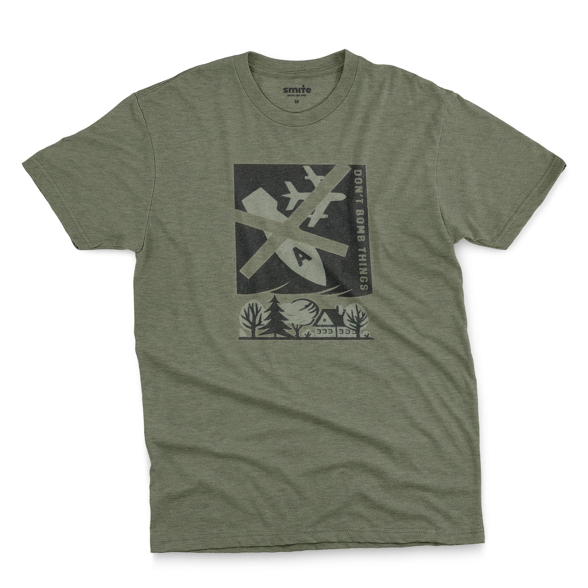 A green t-shirt with a retro graphic print of an anti-war message featuring a cross, a plane, a house, and the text 'DON'T BOMB THINGS'.