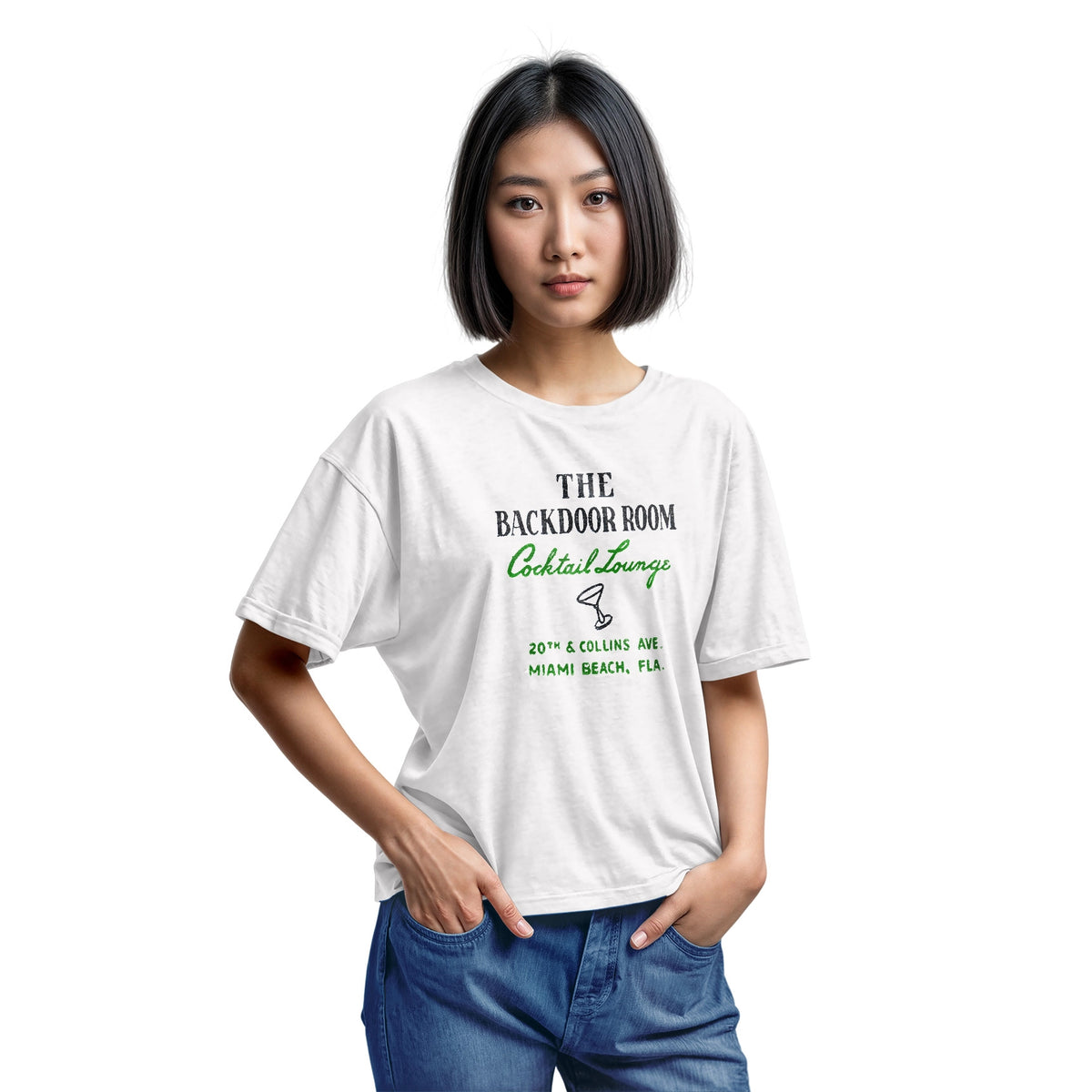A white t-shirt with a retro advertisement for 'THE BACKDOOR ROOM Cocktail Lounge' on Miami Beach, Florida.