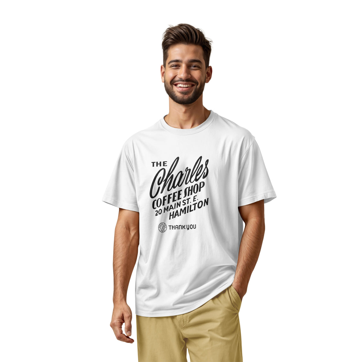 A white t-shirt with a retro typographic logo for The Charles Coffee Shop in Hamilton.