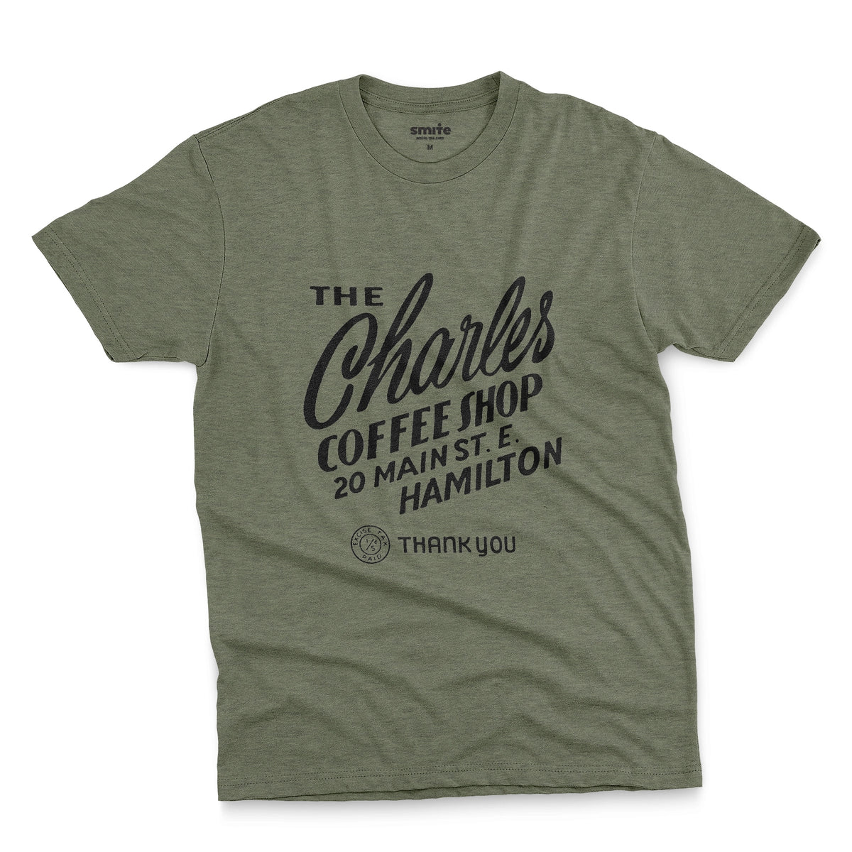 A green t-shirt with a retro typographic logo for The Charles Coffee Shop in Hamilton.