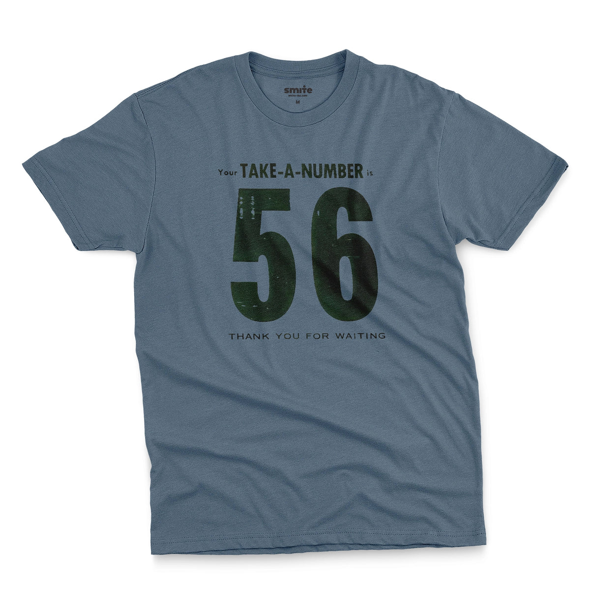 A blue t-shirt with a 1960s retro graphic reading 'Your TAKE-A-NUMBER is 56 THANK YOU FOR WAITING' in distressed typography.
