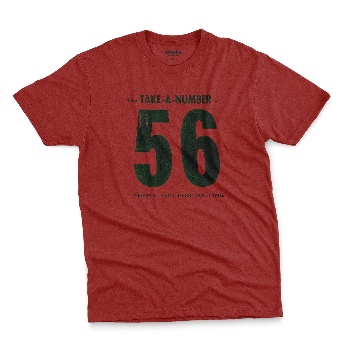 A red t-shirt with a 1960s retro graphic reading 'Your TAKE-A-NUMBER is 56 THANK YOU FOR WAITING' in distressed typography.