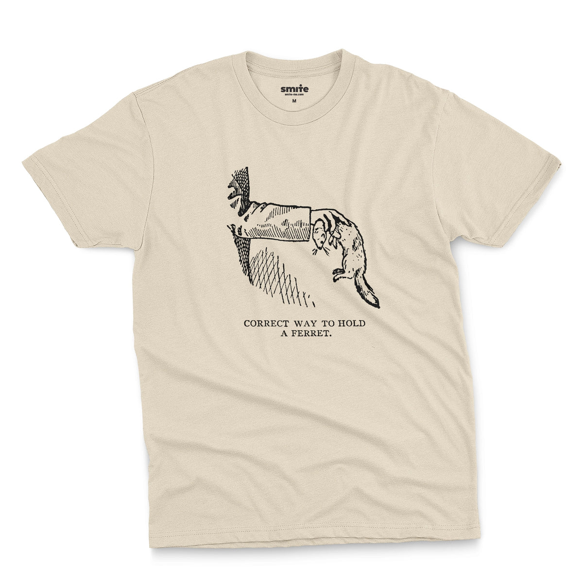 A beige t-shirt with a vintage engraved illustration of an arm holding a ferret and text saying: Correct way to hold a ferret.