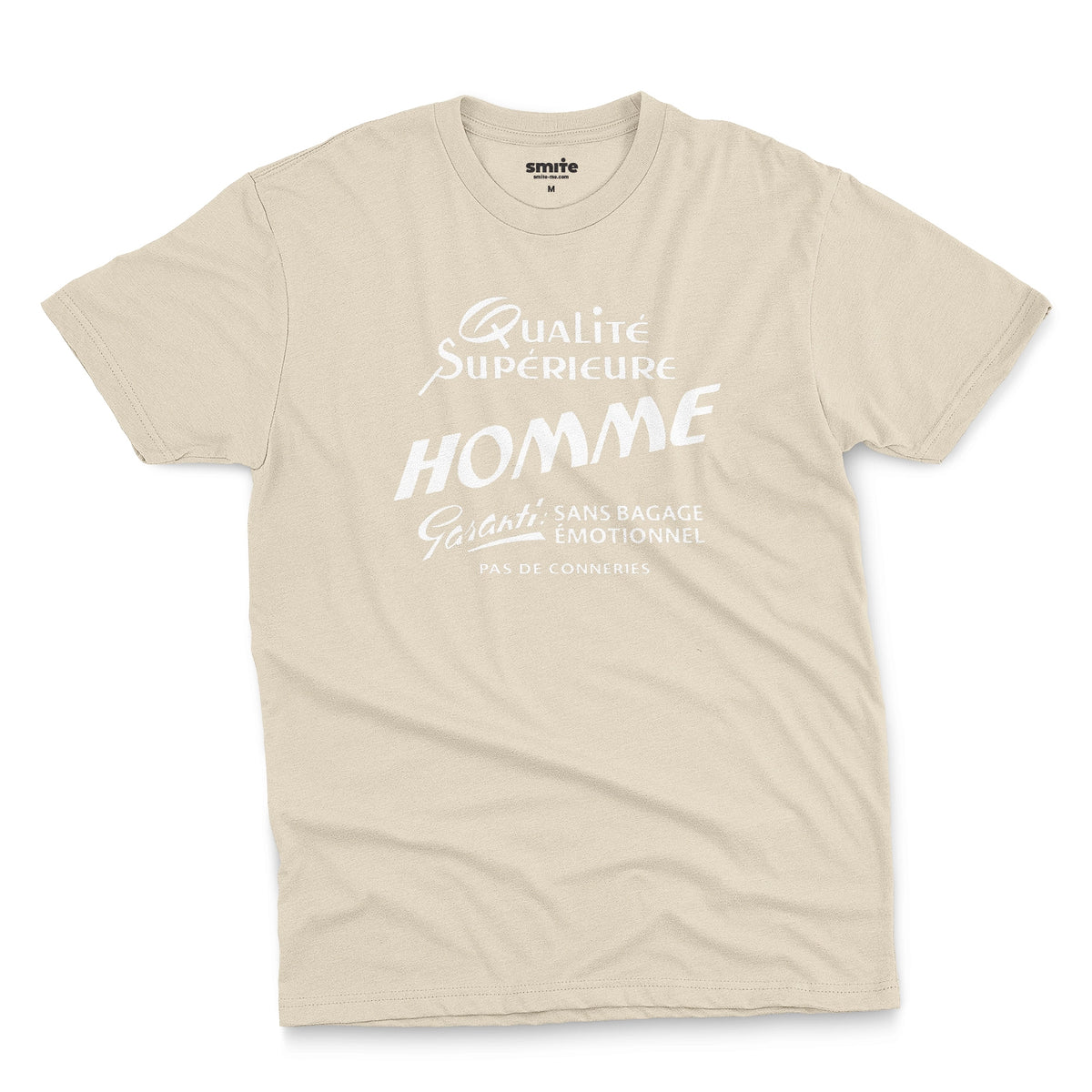 A beige t-shirt with white French text printed on the front. It translates as 'Superior Quality Man Guarantee: No Emotional Baggage'.