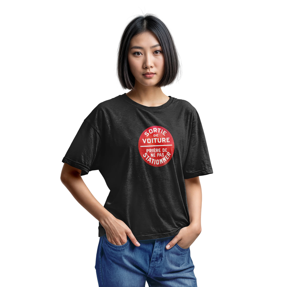 A black t-shirt with a retro red and white graphic on the chest with French text 'SORTIE DE VOITURE PRIERE DE NE PAS STATIONNER'.