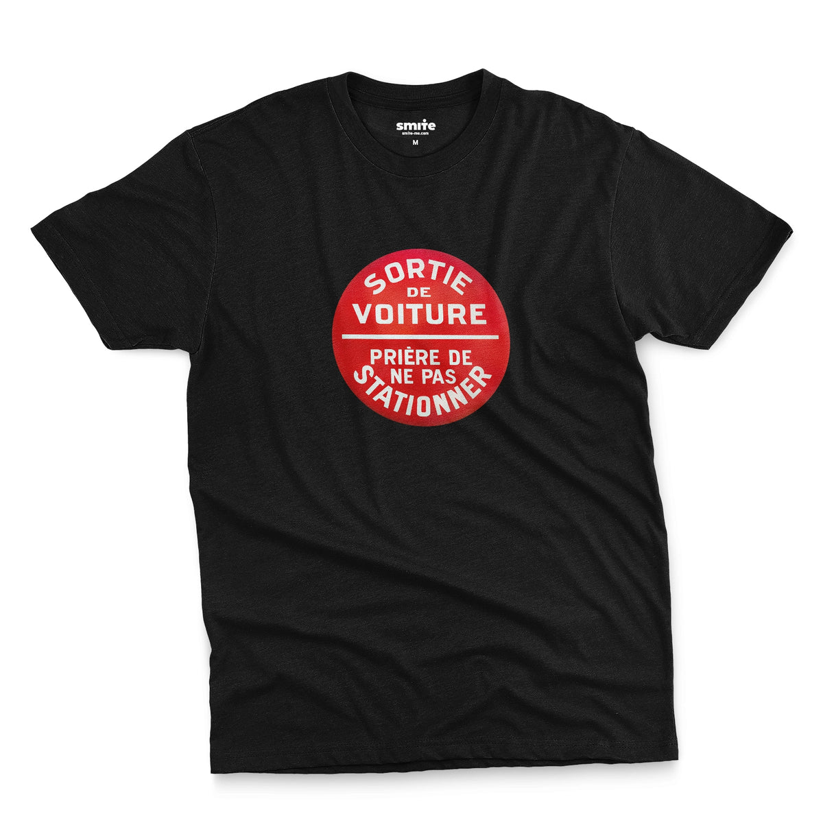 A black t-shirt with a retro red and white graphic on the chest with French text 'SORTIE DE VOITURE PRIERE DE NE PAS STATIONNER'.