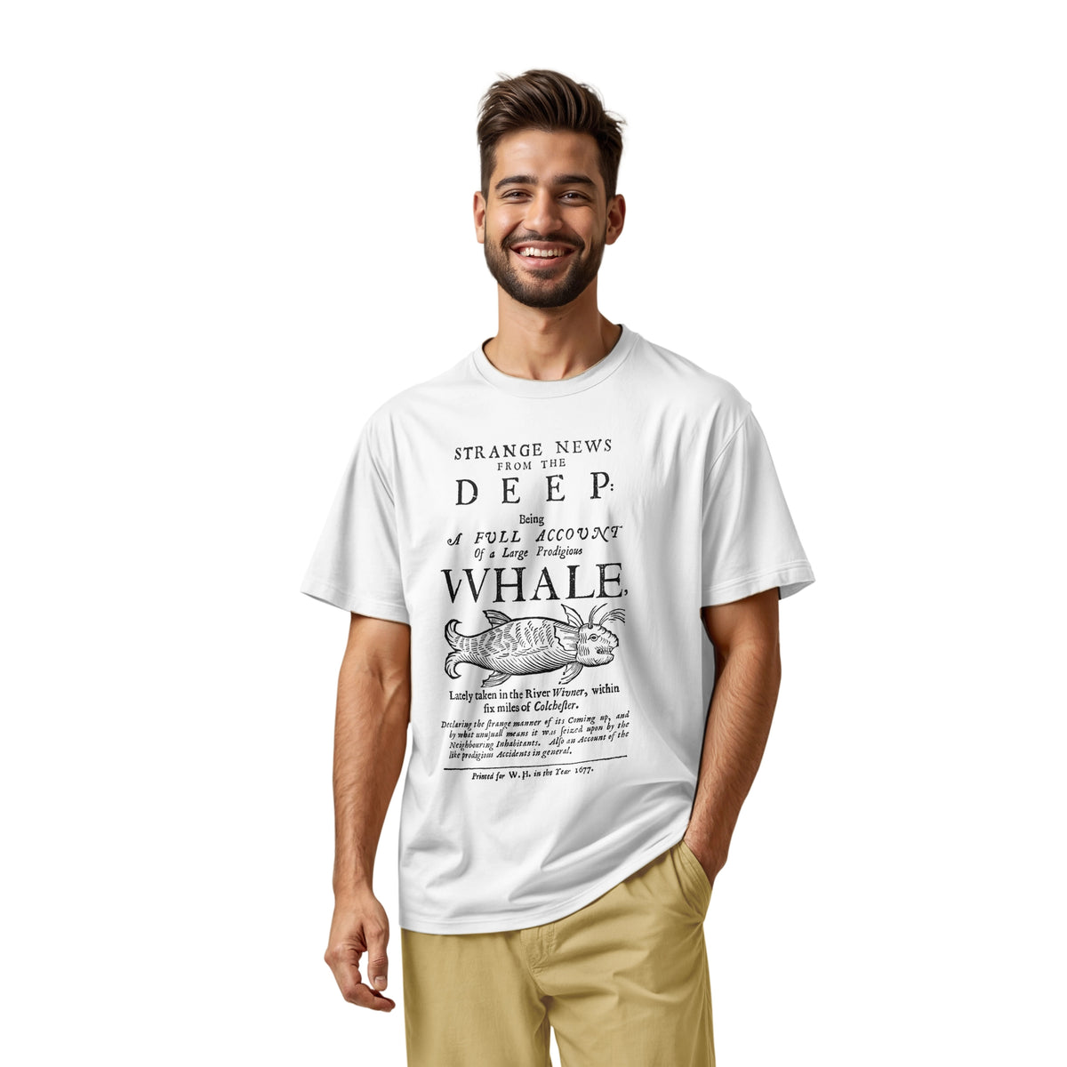 A white t-shirt with a graphic cover page print from 1677 about a whale caught in a river.