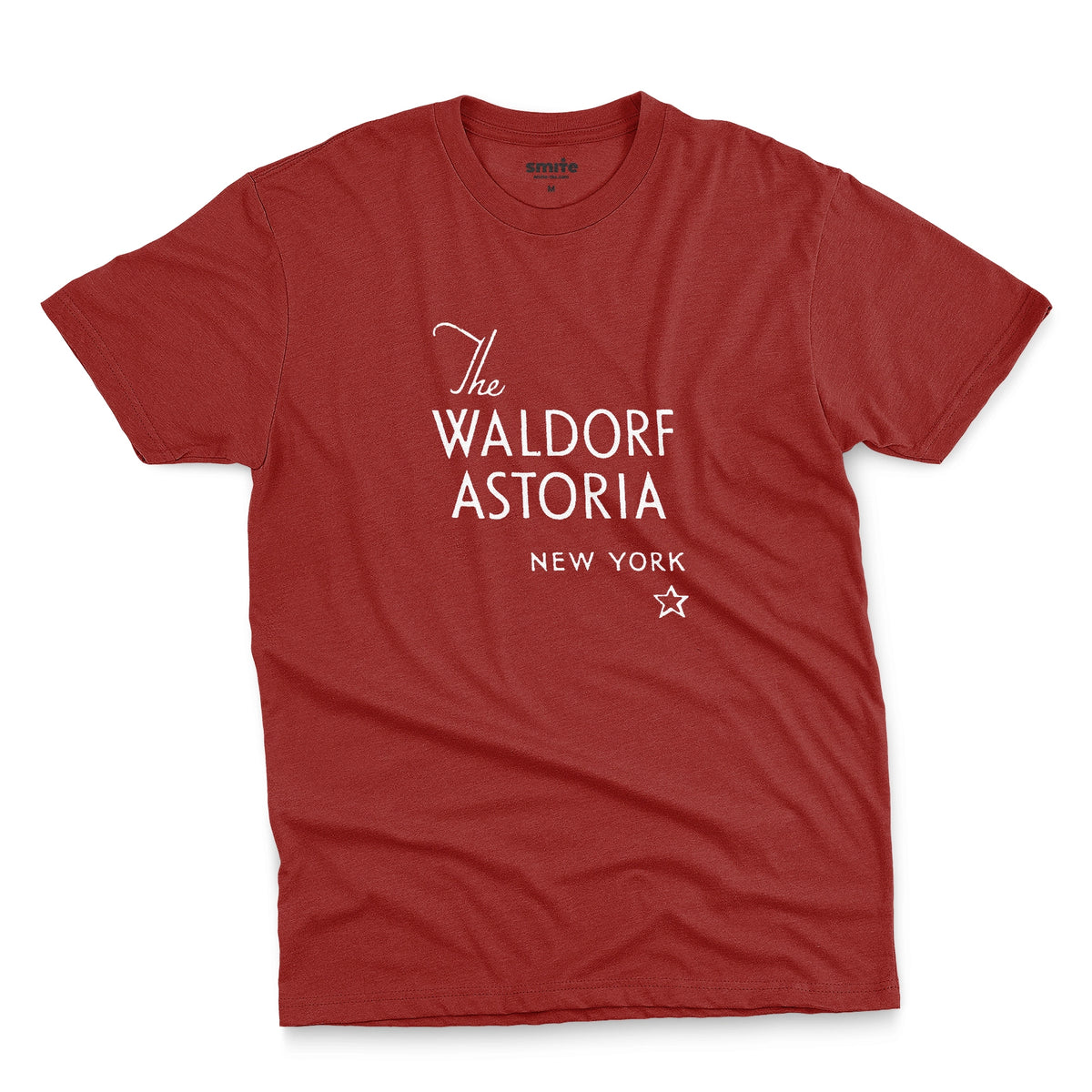 A red t-shirt with a retro logo for The Waldorf Astoria hotel in New York.