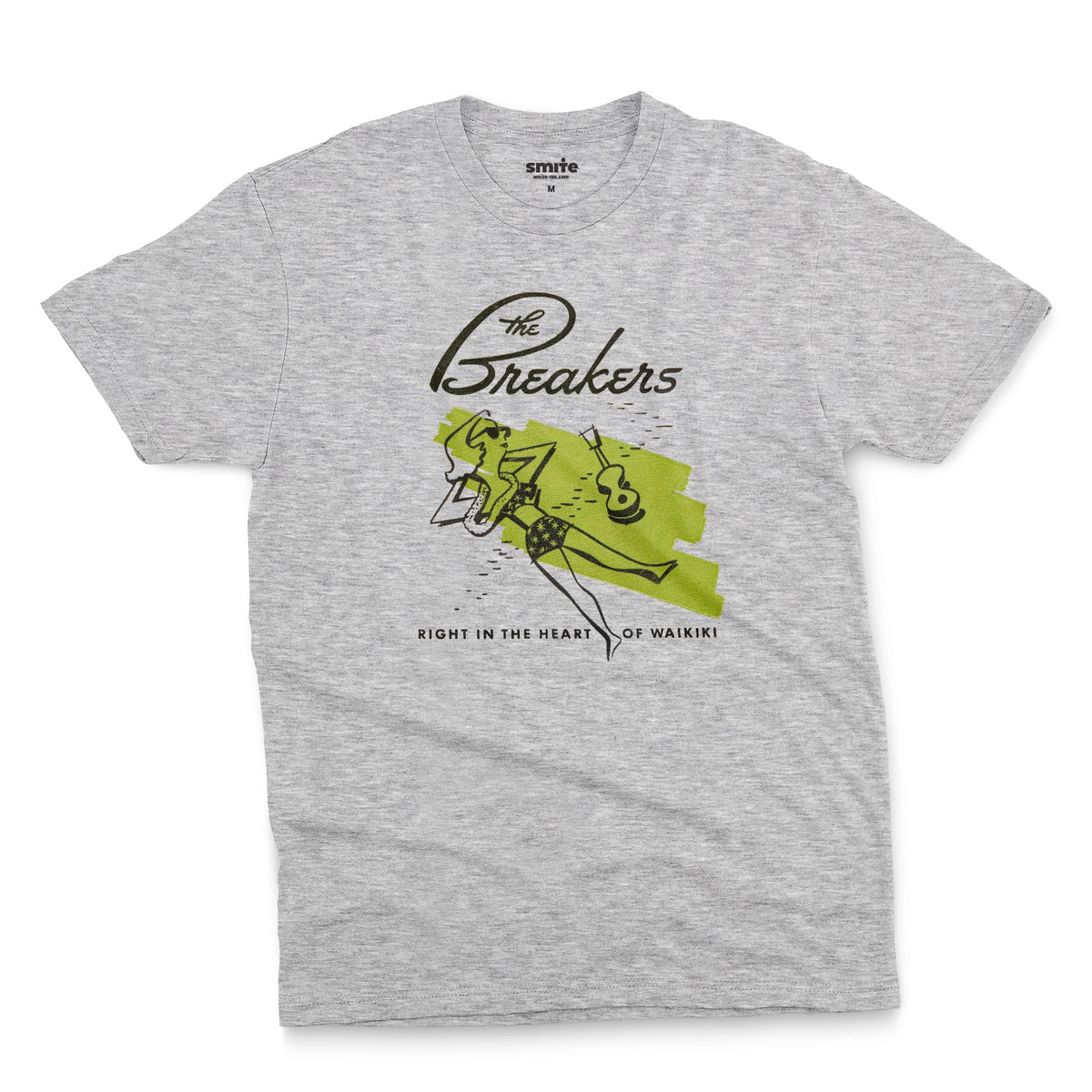 A gray marle t-shirt featuring a retro illustration of a woman sunbathing, advertising The Breakers, a Hawaiian hotel.