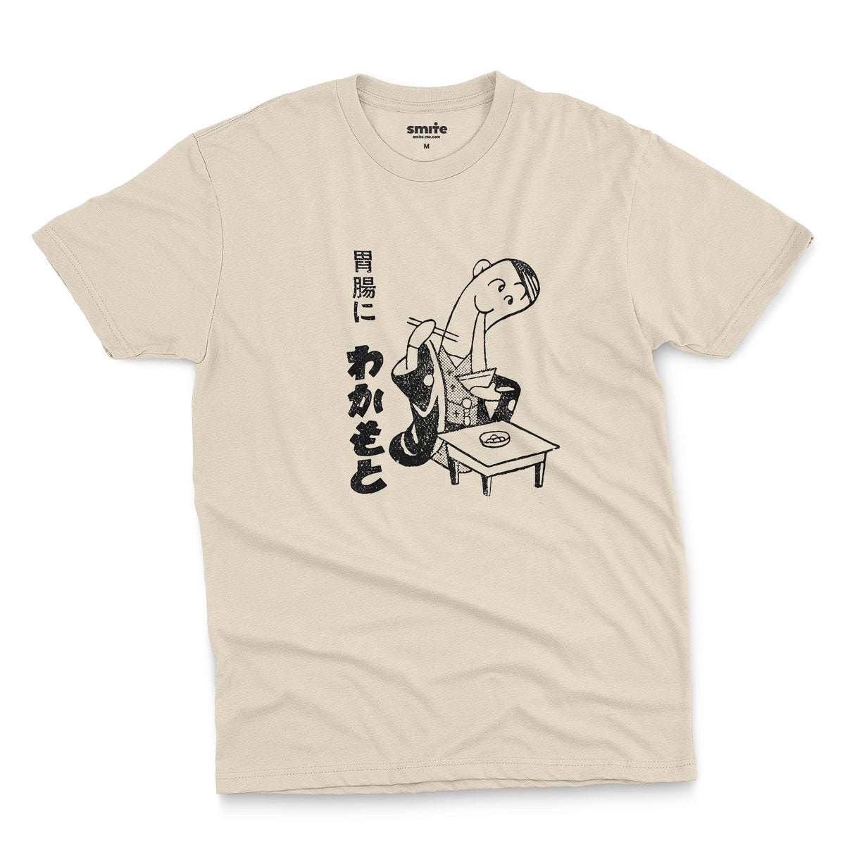 A beige t-shirt with an advertisement for Wakamoto digestive tablets from a 1933 Japanese newspaper featuring a cartoon character in a kimono eating ramen next to Japanese text.