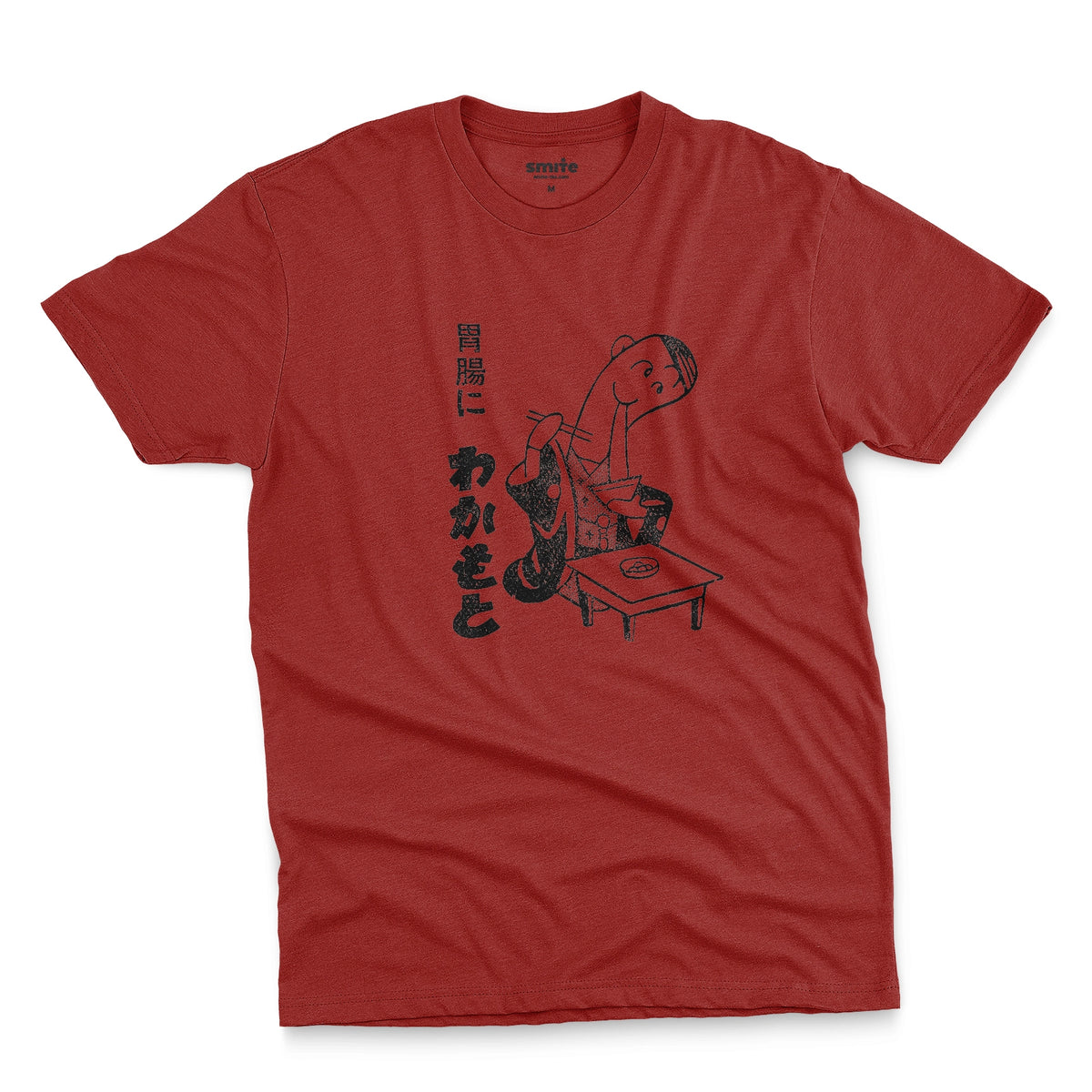 A red t-shirt with an advertisement for Wakamoto digestive tablets from a 1933 Japanese newspaper featuring a cartoon character in a kimono eating ramen next to Japanese text.