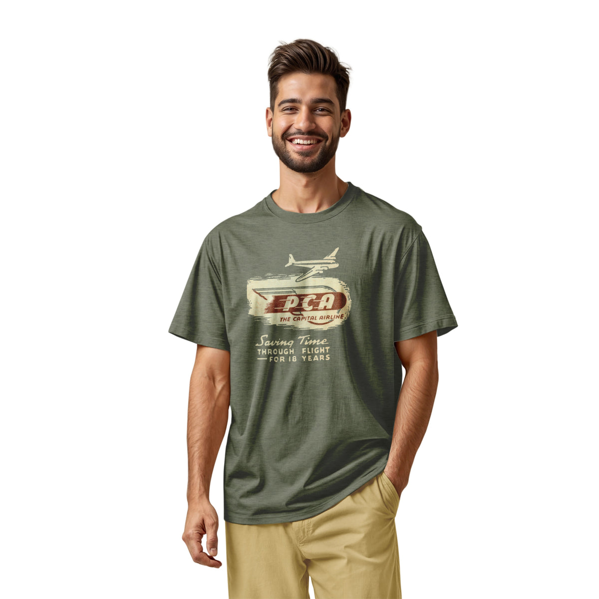 A green t-shirt featuring a vintage graphic advertisement for 'PCA THE CAPITAL AIRLINE'.