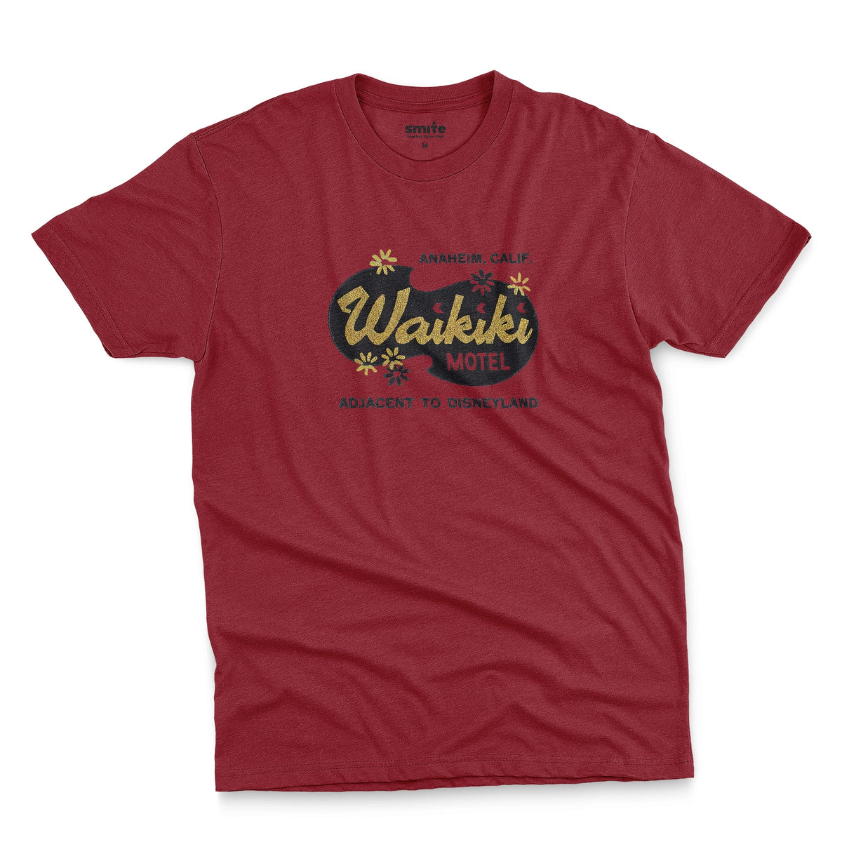 A red t-shirt with a retro advertisement for the 'Waikiki Motel' in Anaheim, California.