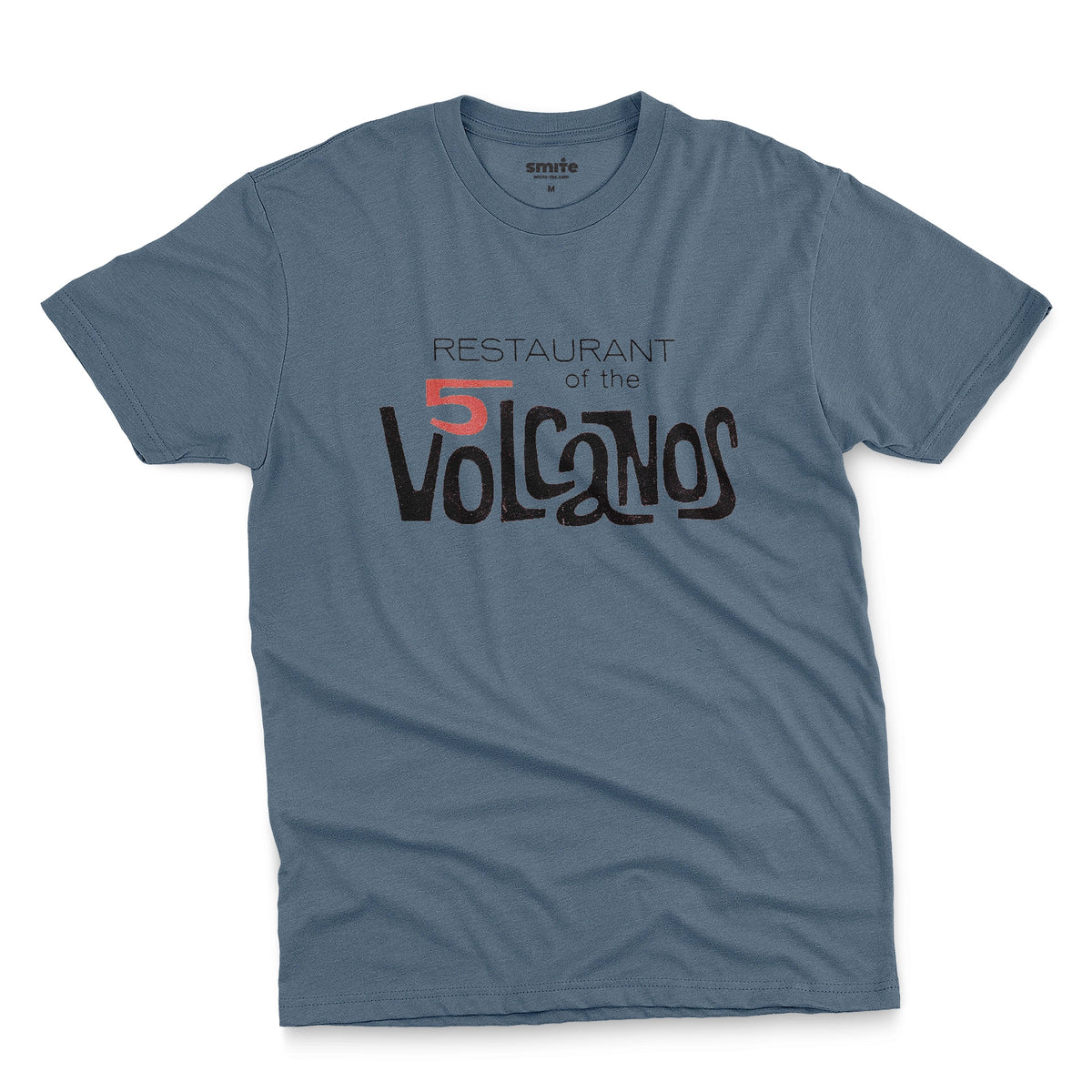 A blue t-shirt with a vintage logo for the 'Restaurant of the 5 Volcanos', the Hawaiian Pavlion's restaurant at the New York World's Fair, 1964.