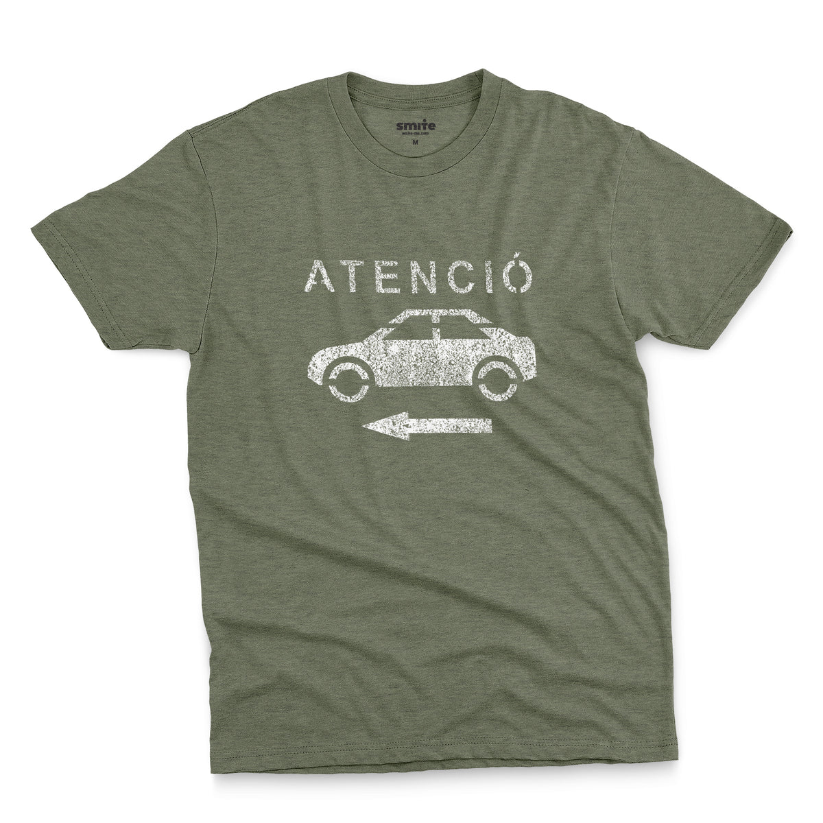 A green t-shirt with a retro white stencil graphic of a car and the Spanish word 'ATENCIÓ'.
