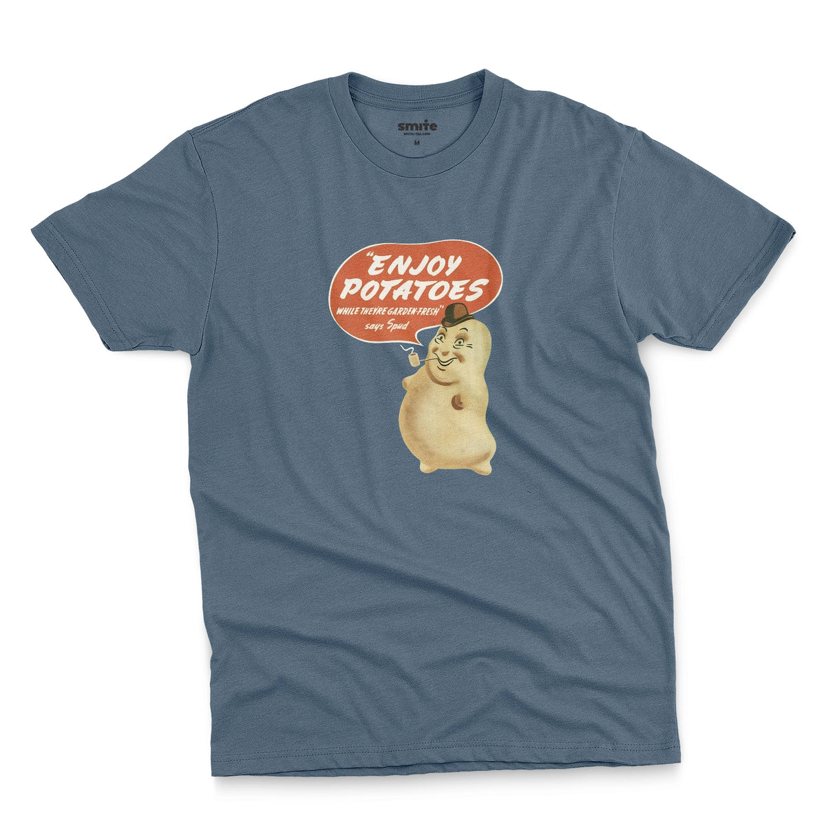 A blue t-shirt with a vintage graphic of a smiling potato character and a speech bubble that reads 'ENJOY POTATOES'.