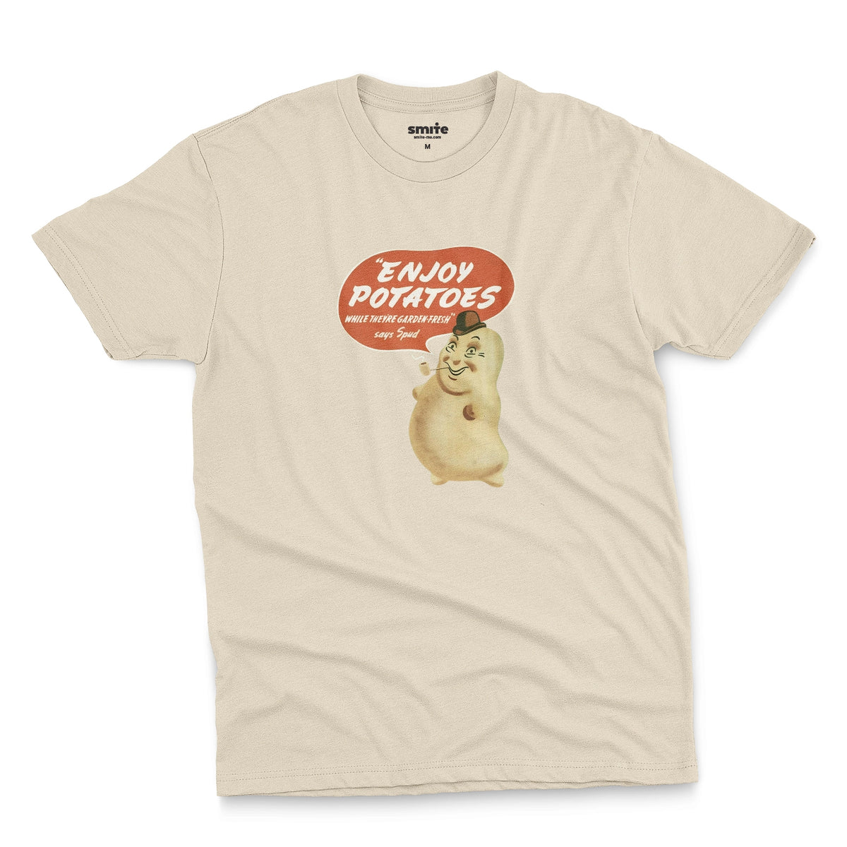 A beige t-shirt with a vintage graphic of a smiling potato character and a speech bubble that reads 'ENJOY POTATOES'.