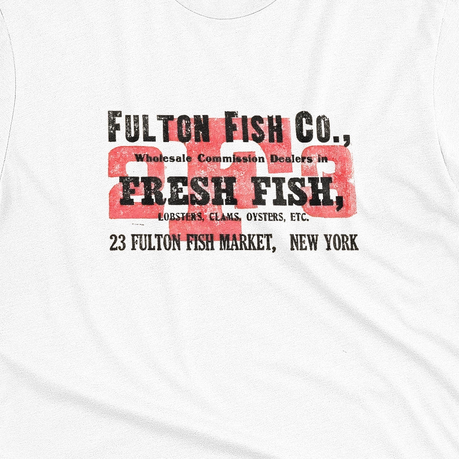 A white t-shirt with an advertisement for the 'FULTON FISH CO' in New York from the 1970s.