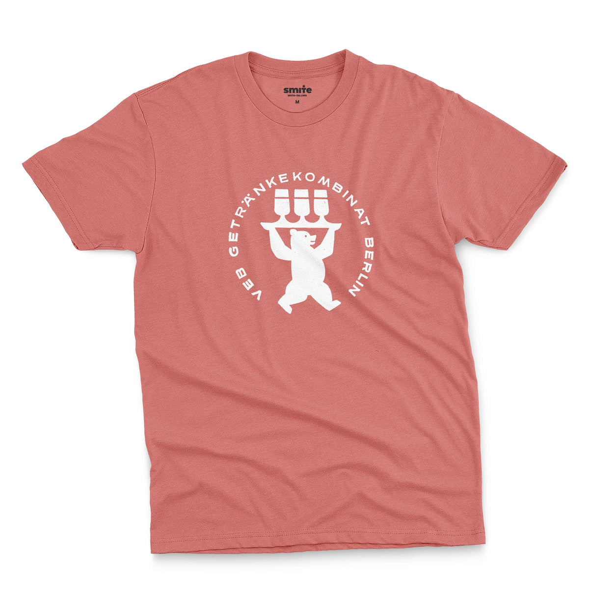 A coral pink t-shirt featuring a vintage graphic print of a bear holding three beer glasses, taken from a beer coaster in Berlin.
