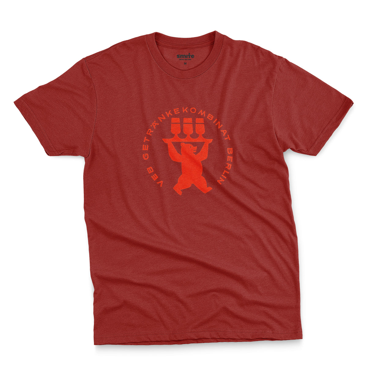A red t-shirt featuring a vintage graphic print of a bear holding three beer glasses, taken from a beer coaster in Berlin.