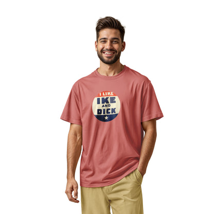 A coral pink t-shirt with  retro Eisenhower Nixon 1956 presidential campaign pin graphic.
