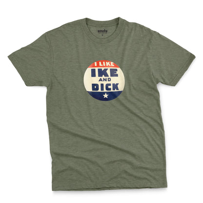 A green t-shirt with  retro Eisenhower Nixon 1956 presidential campaign pin graphic.