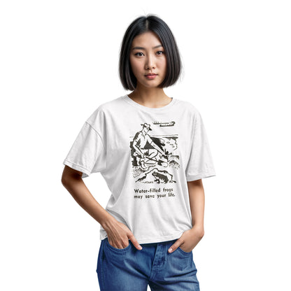 A white t-shirt with a graphic print of an illustration from a World War 2 Australian Army handbook about finding and eating frogs.