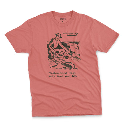A red t-shirt with a graphic print of an illustration from a World War 2 Australian Army handbook about finding and eating frogs.