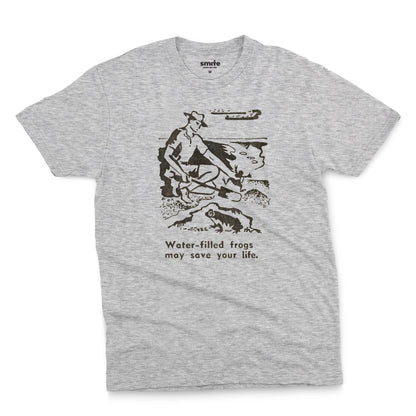 A grey marle t-shirt with a graphic print of an illustration from a World War 2 Australian Army handbook about finding and eating frogs.