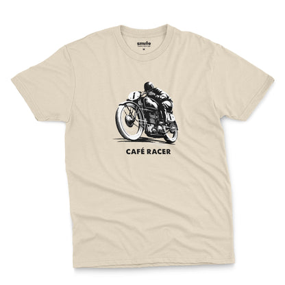 A beige t-shirt featuring a black and white graphic of a vintage motorcycle with a rider, with the text 'CAFÉ RACER' printed below it.