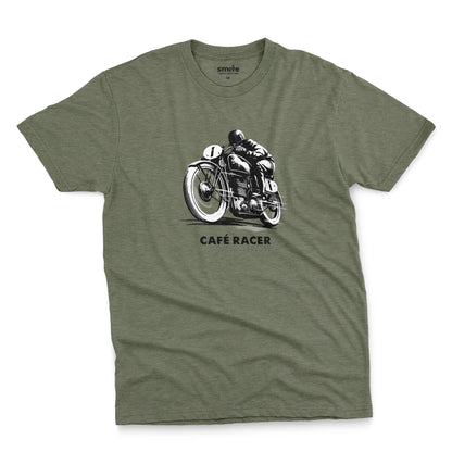 A green t-shirt featuring a black and white graphic of a vintage motorcycle with a rider, with the text 'CAFÉ RACER' printed below it.