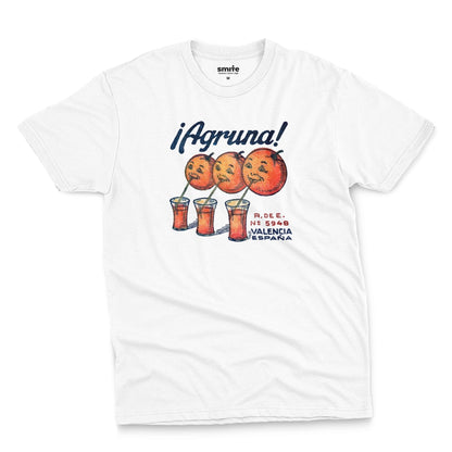 A white t-shirt with a graphic print of Agruna brand fruit crate art from Valencia, Spain in the early 1900's.