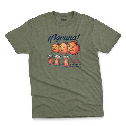 A green t-shirt with a graphic print of Agruna brand fruit crate art from Valencia, Spain in the early 1900's.