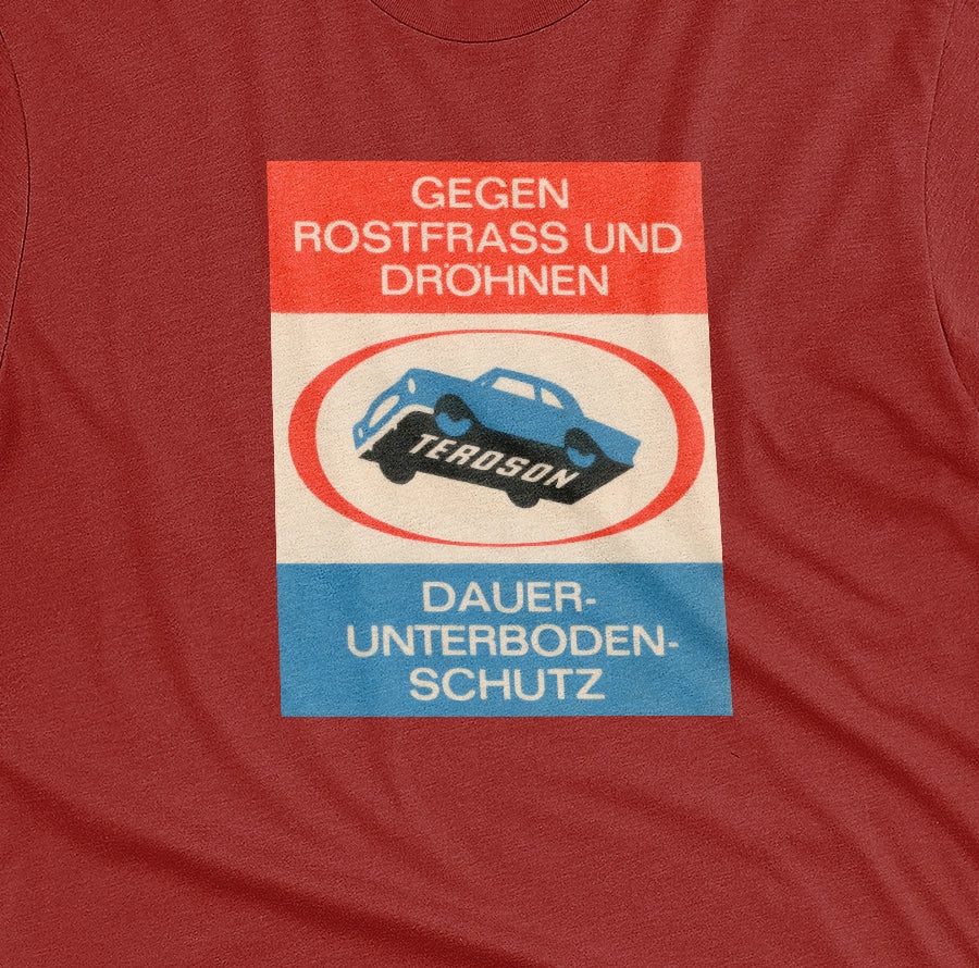 A red t-shirt with a German underbody protection advertisement for Teroson from the 1960s. In English it reads 'Against rust and pounding. Teroson. Permanent underbody protection'.