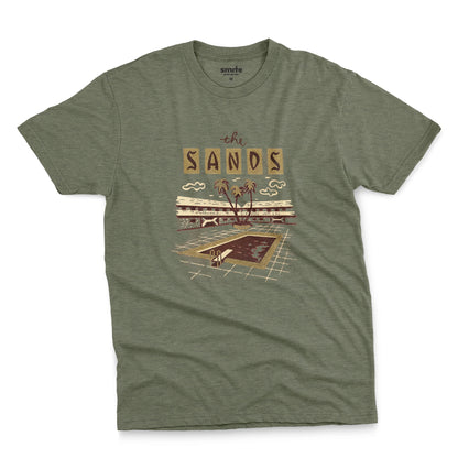 A green t-shirt with a retro advertisement for 'the SANDS' hotel featuring a poolside scene.