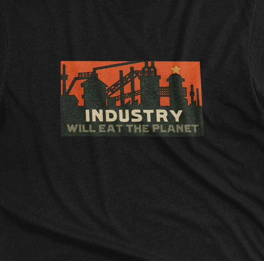 A black t-shirt with a vintage graphic print showing an industrial factory scene with the text 'INDUSTRY WILL EAT THE PLANET'.