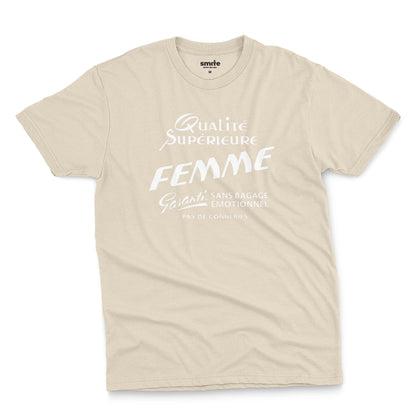 A beige t-shirt with white French text printed on the front. It translates as 'Superior Quality Woman Guarantee: No Emotional Baggage'.